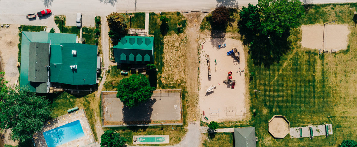 Aerial view of Elim Lodge Playground, Rec Hall, Rustic Chapel, Dining Hall, Cabins and more